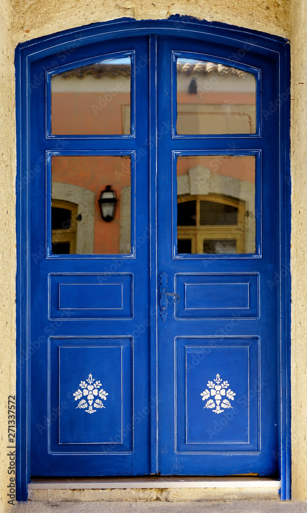 close up retro style old house door of Mediterranean architectural culture in Alacati town of Izmir, Turkey close up retro style old house door of Mediterranean architectural culture in Alacati town of Izmir, Turkey