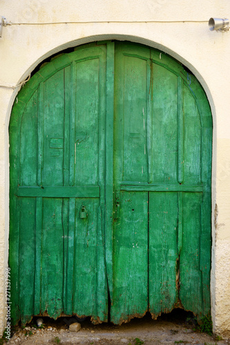 close up retro style old house door of Mediterranean architectural culture in Alacati town of Izmir, Turkey