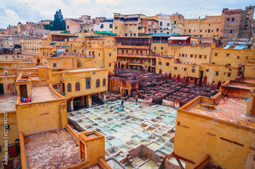 Traditional tannery in ancient medina of Fez, Morocco photo