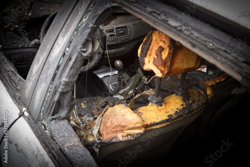 passenger compartment after the fire, partially burned down parts of the car