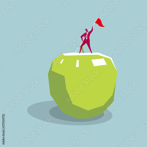 Businessman occupied the apple highlands. Isolated on blue background.