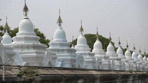 image of the lined up white pagodas of Kuthodaw-Pagode in Mandalay, Myanmar photo