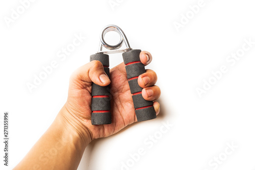 Canvas Print Hand squeezing and gripping hand-grip, strength force, fitness, healthy lifestyle concept on white background, close up selective focus