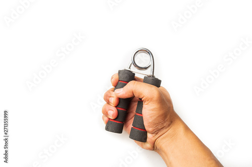 Hand squeezing and gripping hand-grip, strength force, fitness, healthy lifestyle concept on white background, close up selective focus.