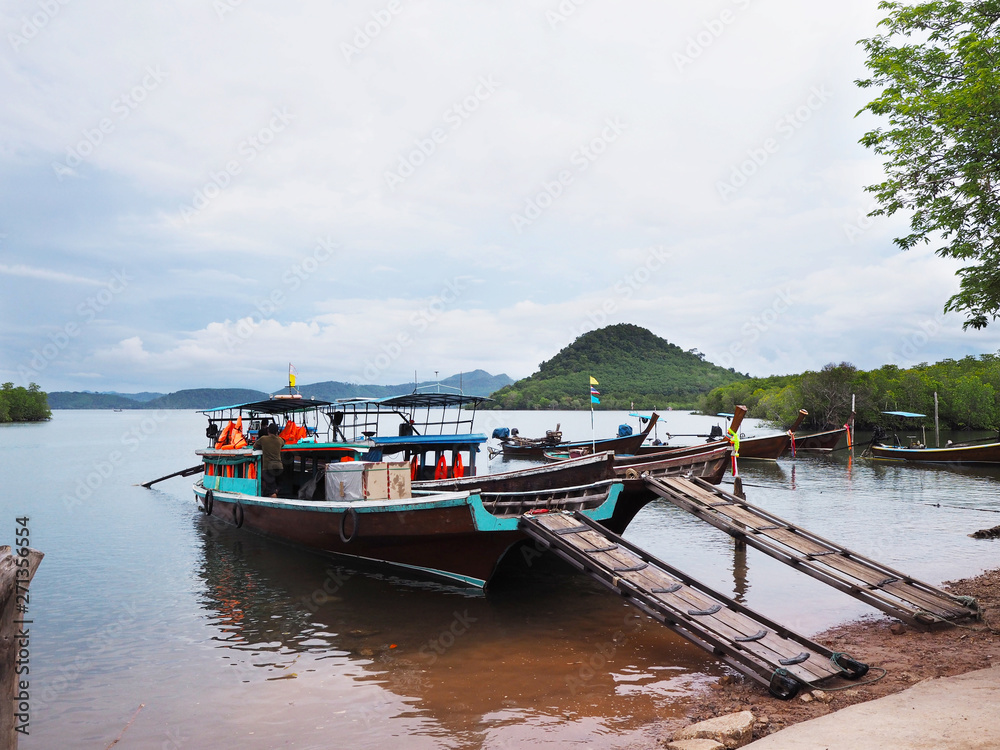 Local ship floating on sea waiting for passenger