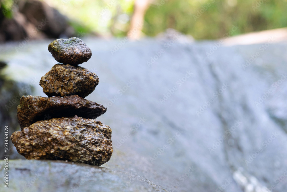 Four stones are arranged vertically and have flowing through the forest. Four stones are arranged vertically and have flowing through the forest.