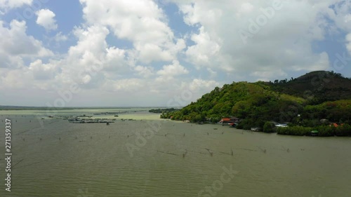 Aerial footage from a drone of Songkla lake on sunny day in Thailand photo