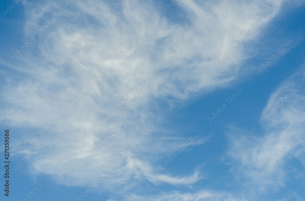 Cirrus clouds in the blue sky