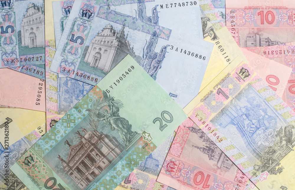 Ukrainian money. Hryvnia paper bill. Small paper notes. Cash. Background texture.