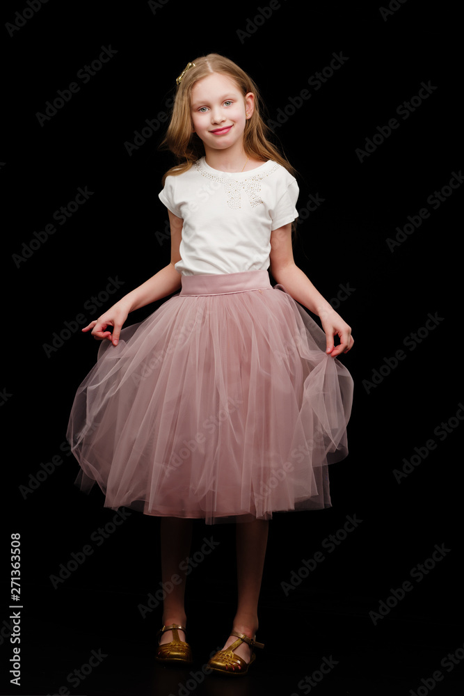 Little girl on a black background Little girl on a black background