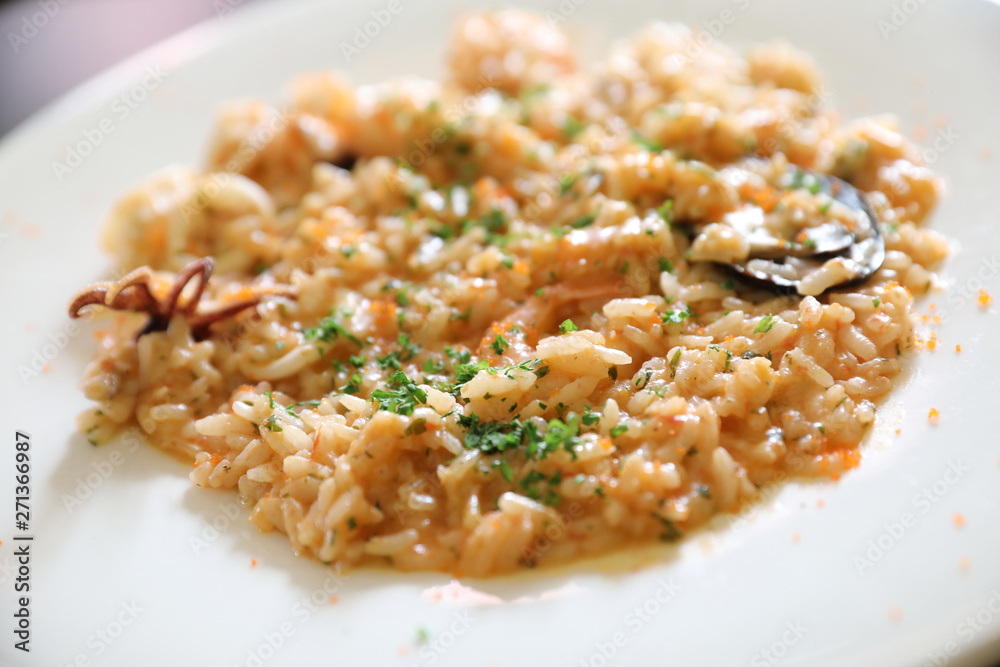 Seafood Risotto , traditional italian rice on table Seafood Risotto , traditional italian rice on table
