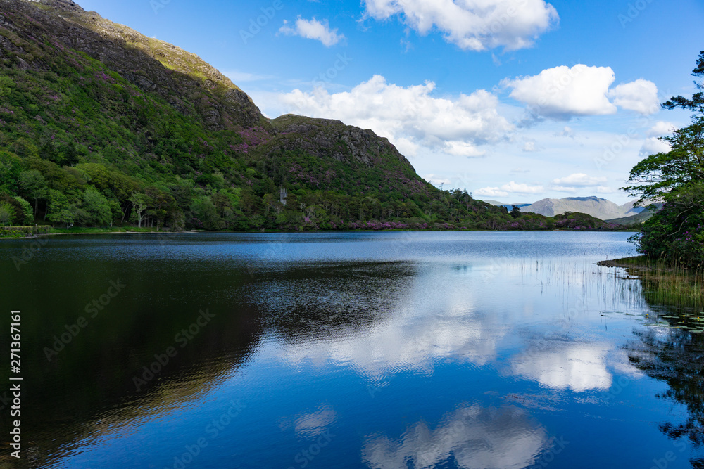 Lake landscape with mountain peaks, Pollacapall Lough in, Connemara, Galway, Ireland.