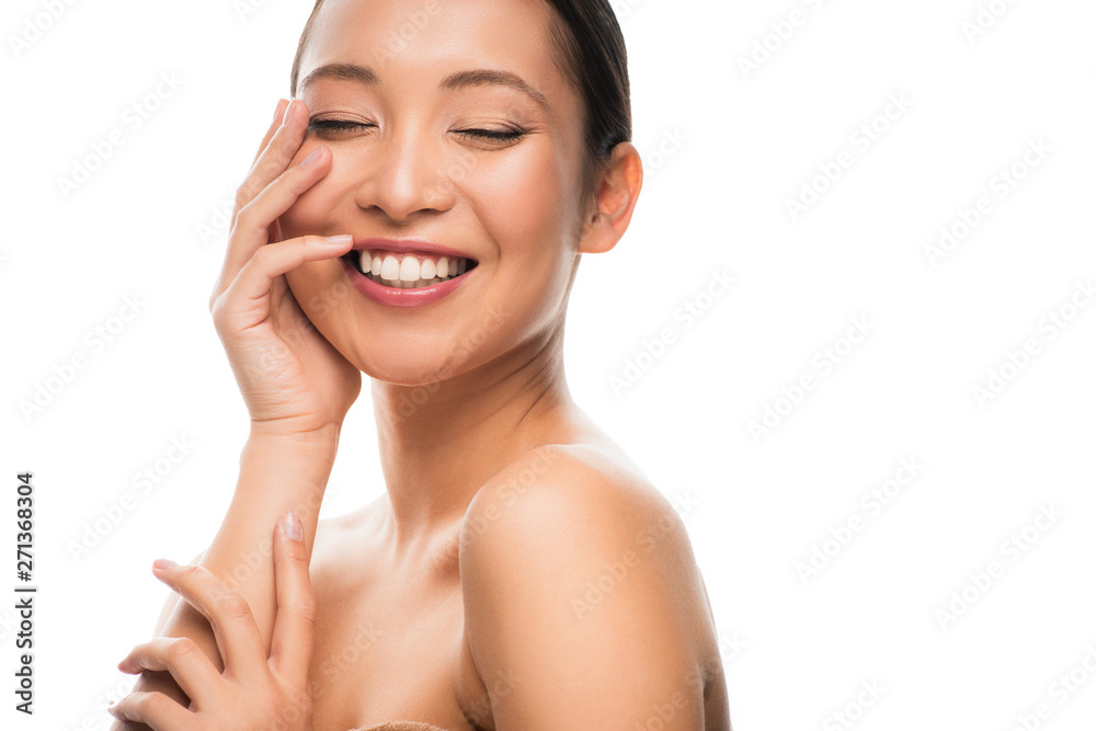cheerful naked asian woman with perfect skin, isolated on white cheerful naked asian woman with perfect skin, isolated on white