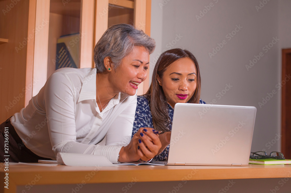 business partners women collaborating and coworking happy and successful at office laptop computer desk in job female colleagues cooperation and success business partners women collaborating and coworking happy and successful at office laptop computer desk in job female colleagues cooperation and success