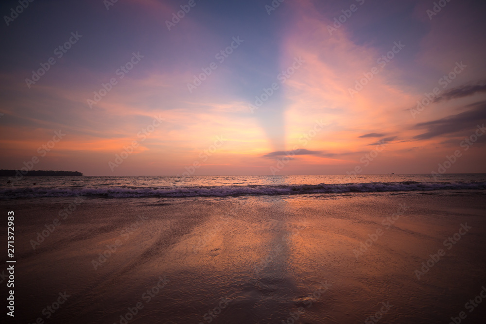 Pink sunset on the beach in Thailand