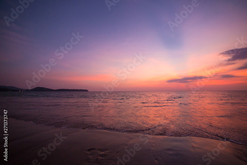 Pink sunset on the beach in Thailand