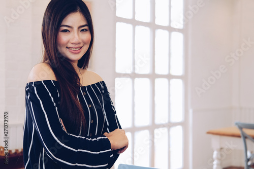 asian woman smiling posing at home