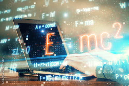 Science formula hologram with man working on computer on background. Education concept. Double exposure.