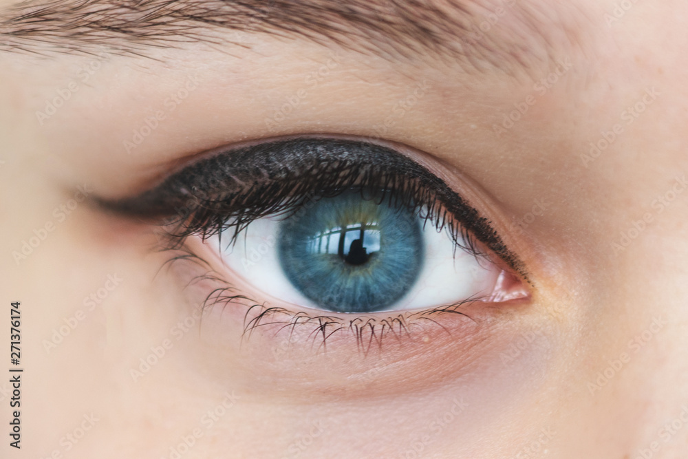 Part of face, beautiful blue woman single eye close up Part of face, beautiful blue woman single eye close up