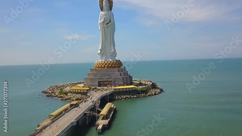 Guanyin of Nanshan, the white statue of the bodhisattva Guanyi near the Nanshan Temple of Sanya, China. (aerial photography)