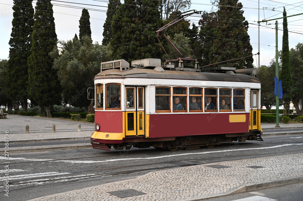 old red tram in lisbon portugal
