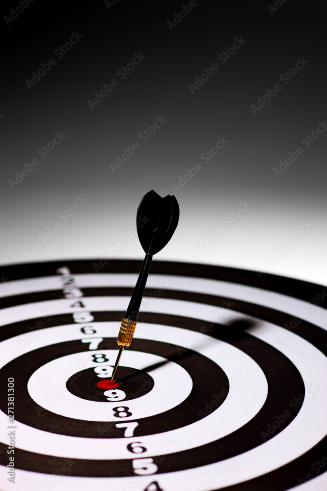 a hit dart in the middle at the target. a hit dart in the middle at the target.