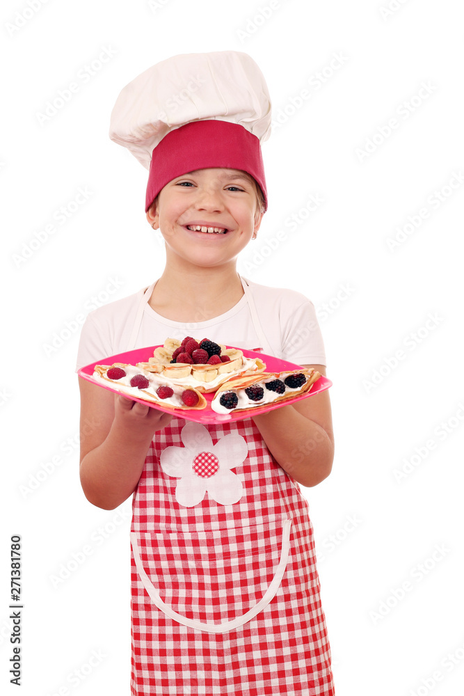 happy little girl cook with delicious sweet crepes and fruits happy little girl cook with delicious sweet crepes and fruits
