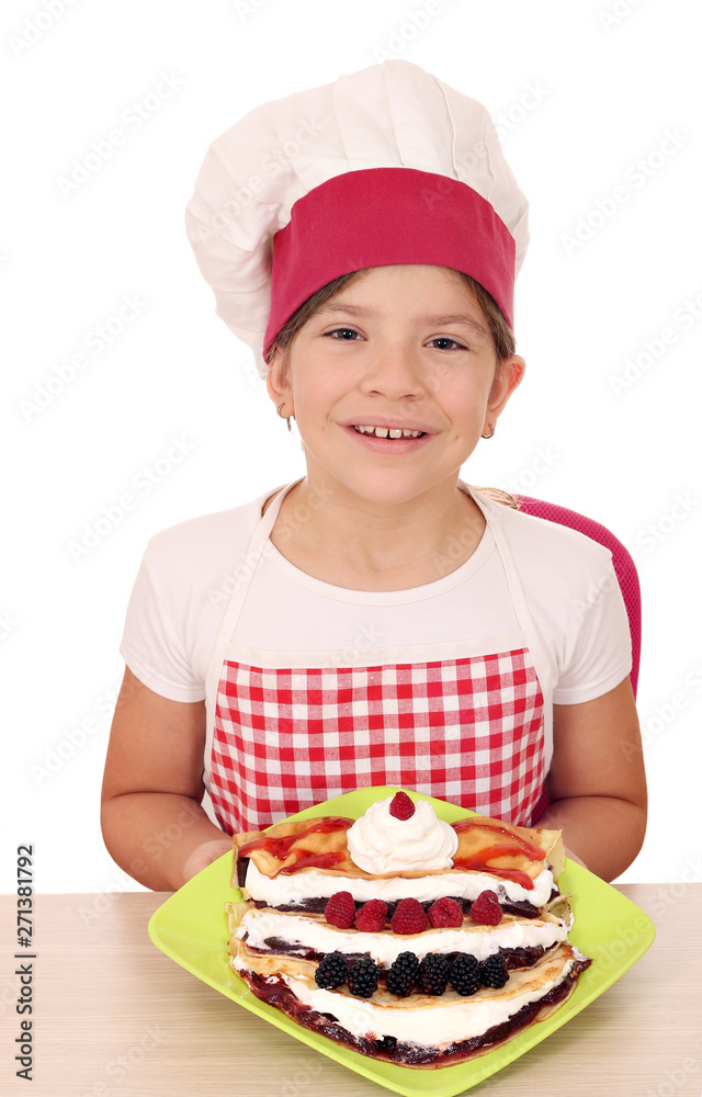 happy little girl cook with sweet crepes and fruits happy little girl cook with sweet crepes and fruits