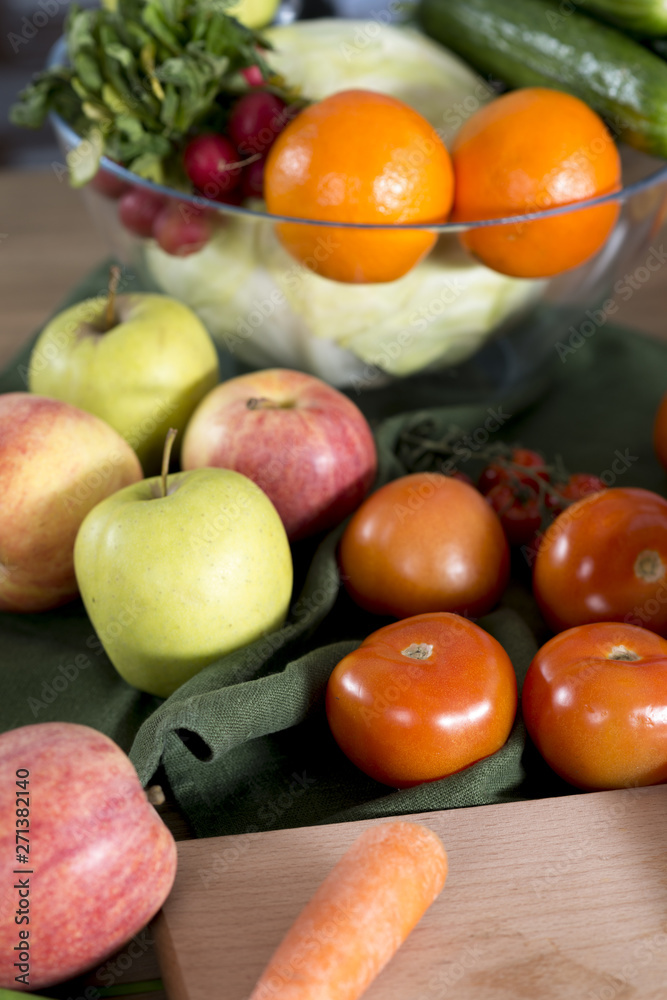 Close-up of fresh vegetables and fruits in kitchen