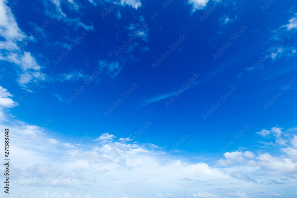 blue sky background with tiny clouds blue sky background with tiny clouds