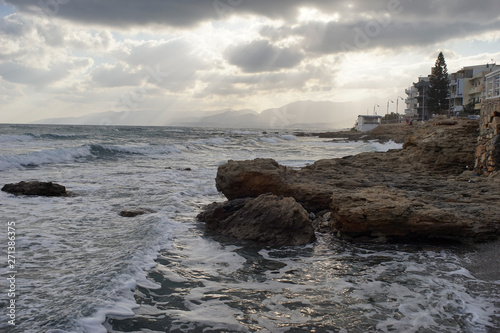 dramatic sunset on a rocky beach