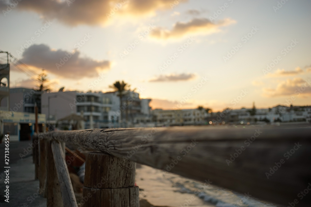 Fototapeta premium sunset over a sea side town