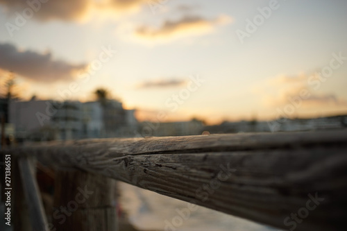 sunset over a sea side town