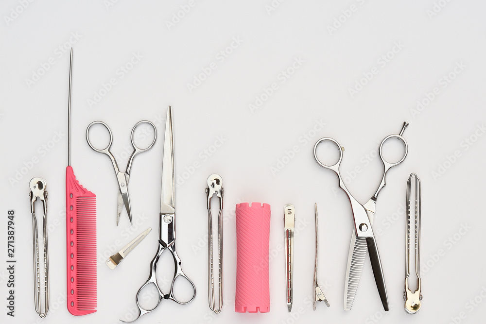 Set of professional hairdresser tools isolated on white background