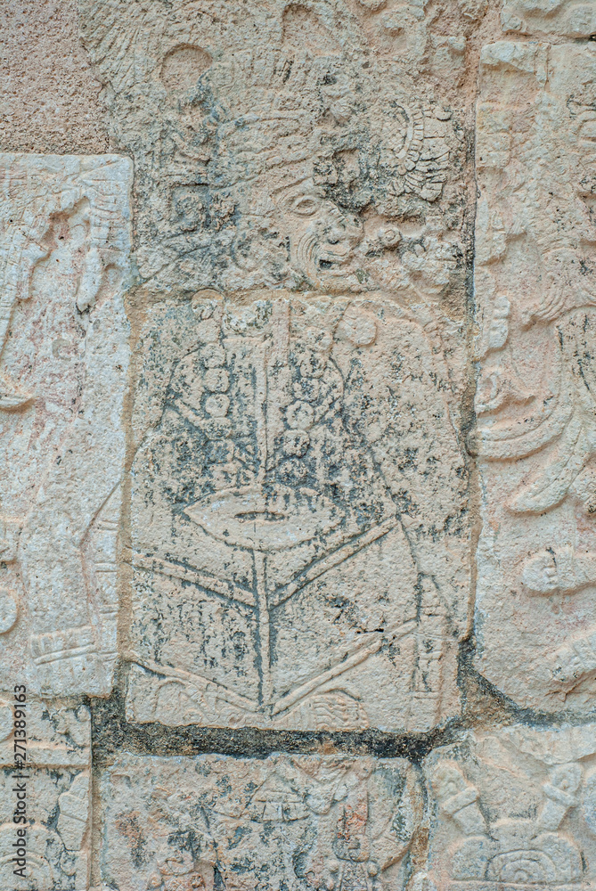 Stone engraving depicting a Mayan warrior, in the archaeological area of Chichen Itza, on the Yucatan peninsula
