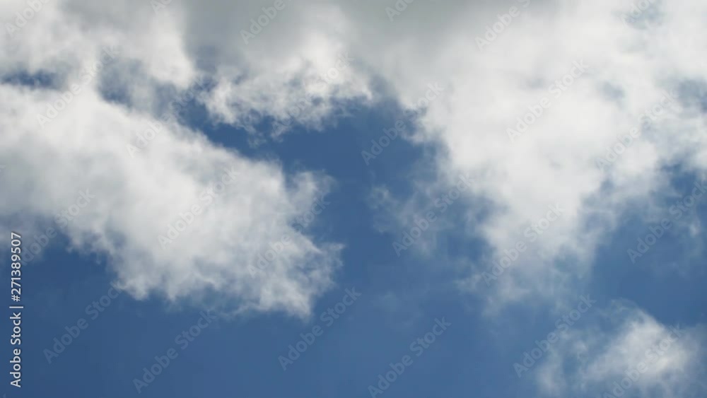 Time lapse clouds, rolling puffy cloud are moving, white lightnes clouds time lapse. Cloud running across the blue sky.4k Timelapse of white clouds with blue sky in background.Beautiful view. Time lapse clouds, rolling puffy cloud are moving, white lightnes clouds time lapse. Cloud running across the blue sky.4k Timelapse of white clouds with blue sky in background.Beautiful view.