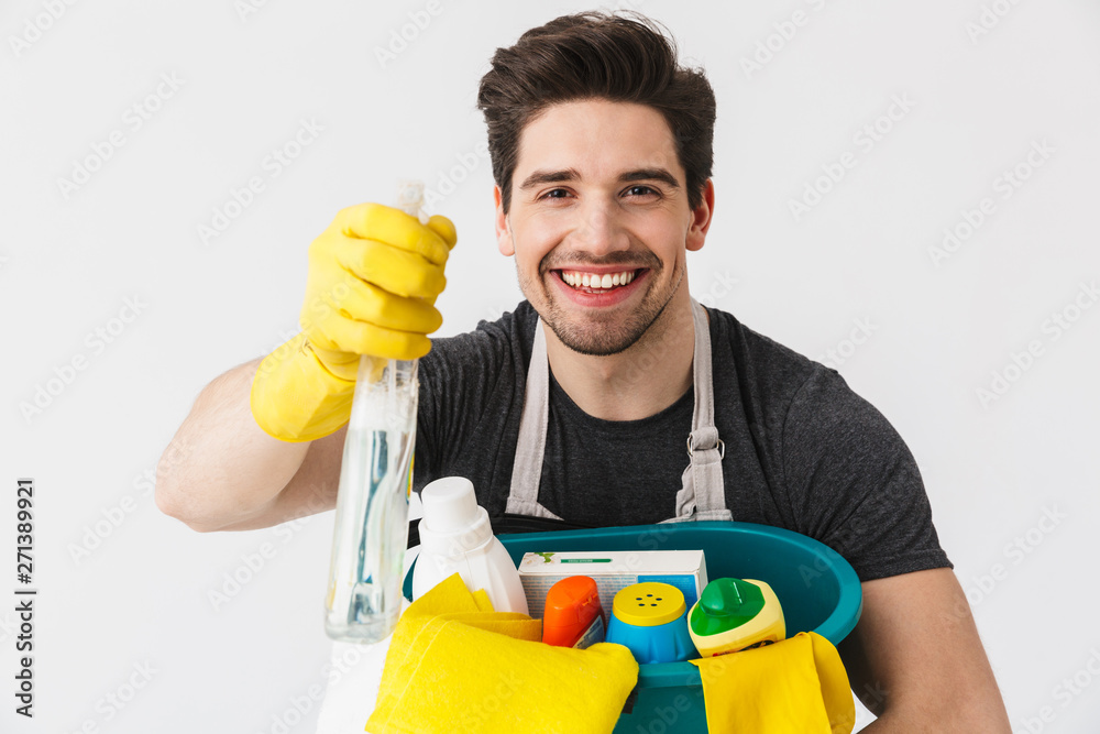 Handsome brunette houseman wearing apron Handsome brunette houseman wearing apron
