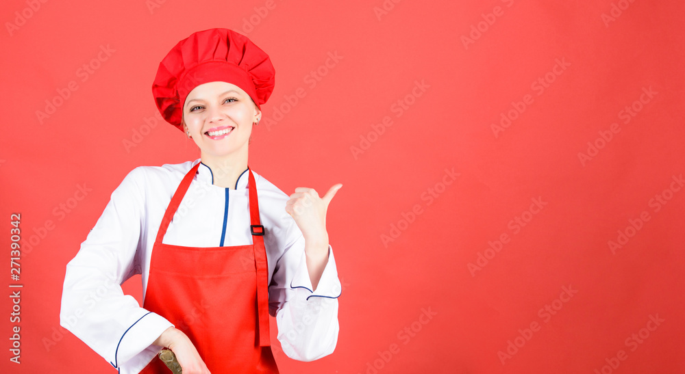 woman in cook hat and apron. professional chef in kitchen. Cuisine. happy woman cooking healthy food by recipe. Housewife with cooking knife. copy space. My favourite breakfast woman in cook hat and apron. professional chef in kitchen. Cuisine. happy woman cooking healthy food by recipe. Housewife with cooking knife. copy space. My favourite breakfast
