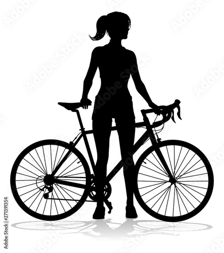 A woman bicycle riding bike cyclist in silhouette © Christos Georghiou