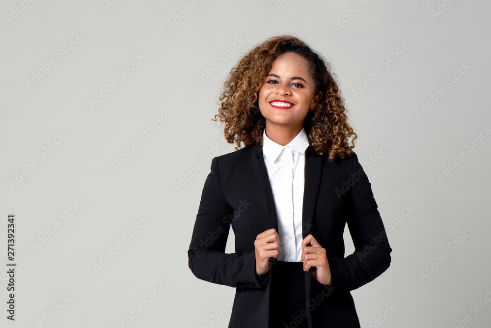 Happy smiling African American woman in formal business attire - obrazy, fototapety, plakaty 