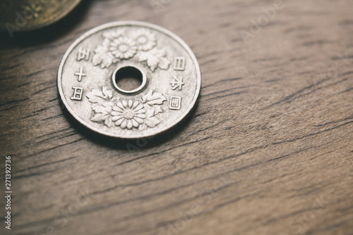50 Yen Japanese coin money on wood table background