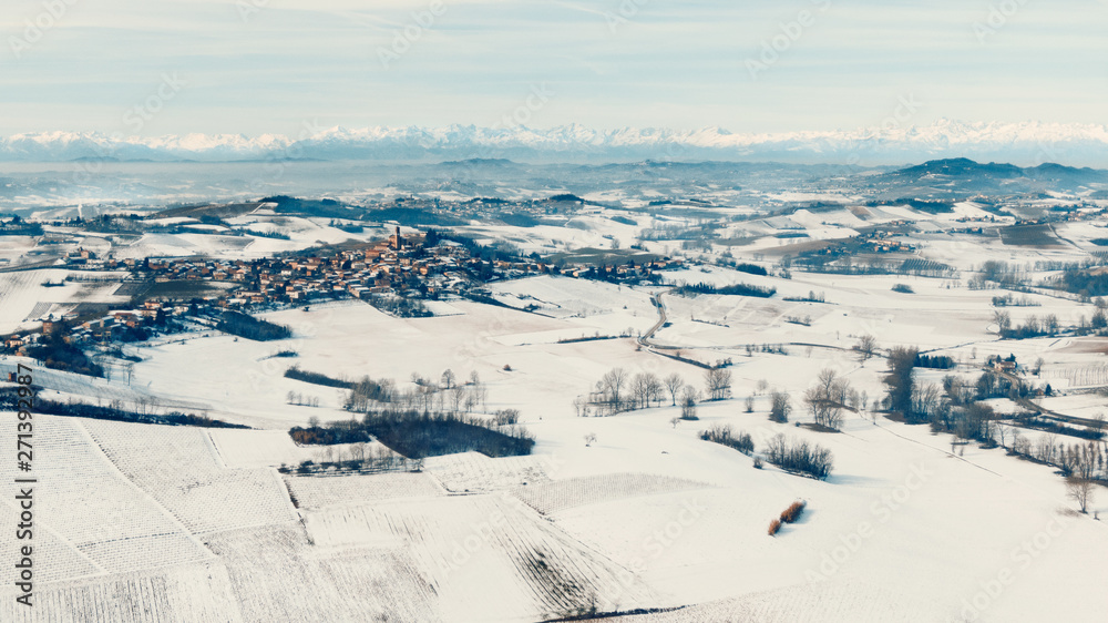 Aerial drone view of Monferrato hills covered with snow