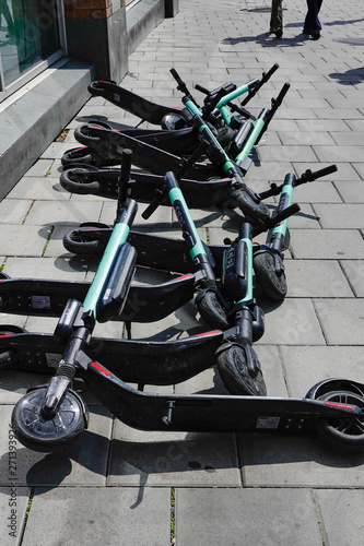 Canvas Print Stockholm, Sweden Electric micro-mobility scooters are an increasing problem on the city's sidewalks and streets