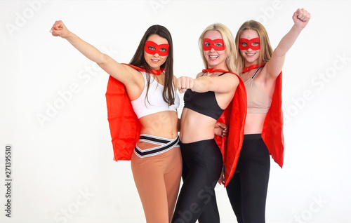 Obraz na plátně Young superwomen wearing sport clothes