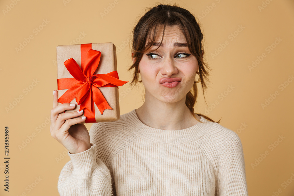 Beautiful young woman wearing sweater standing