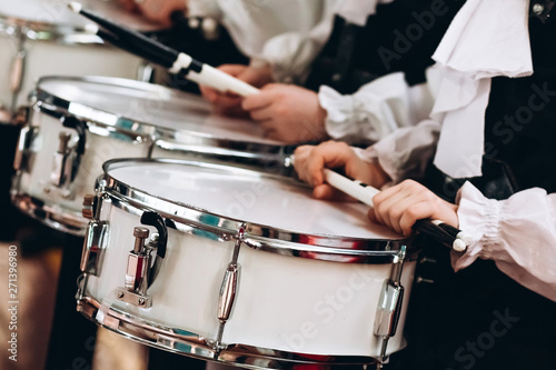 Photography A closeup of the hands of a drummer at a parade