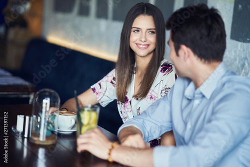 Romantic couple dating in restaurant