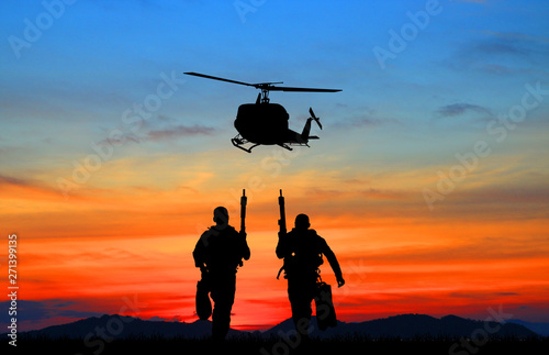  Navy seal silhouettes on sunrise
