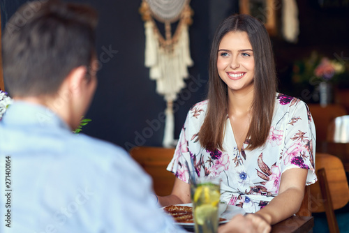 Фотография Romantic couple dating in restaurant