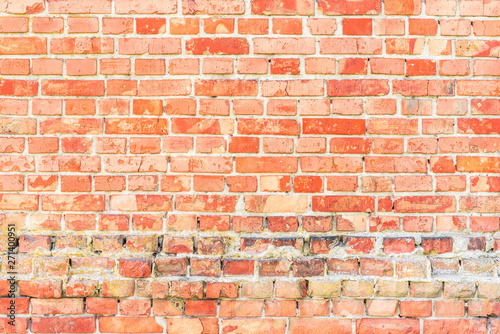 Texture, brick, wall, it can be used as a background. Brick texture with scratches and cracks